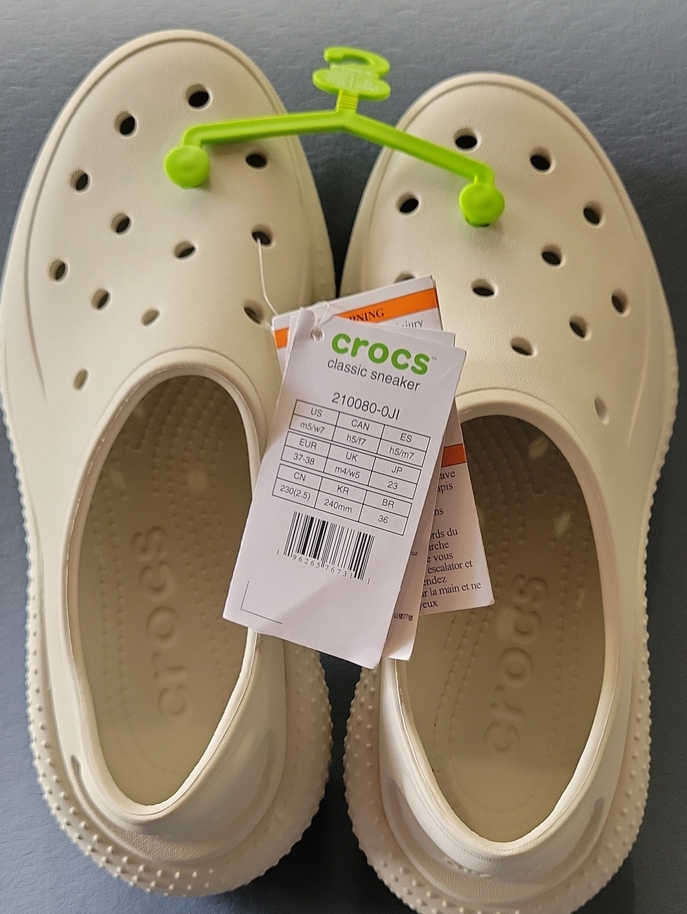 Crocs Unisex Classic Sneaker in Cream